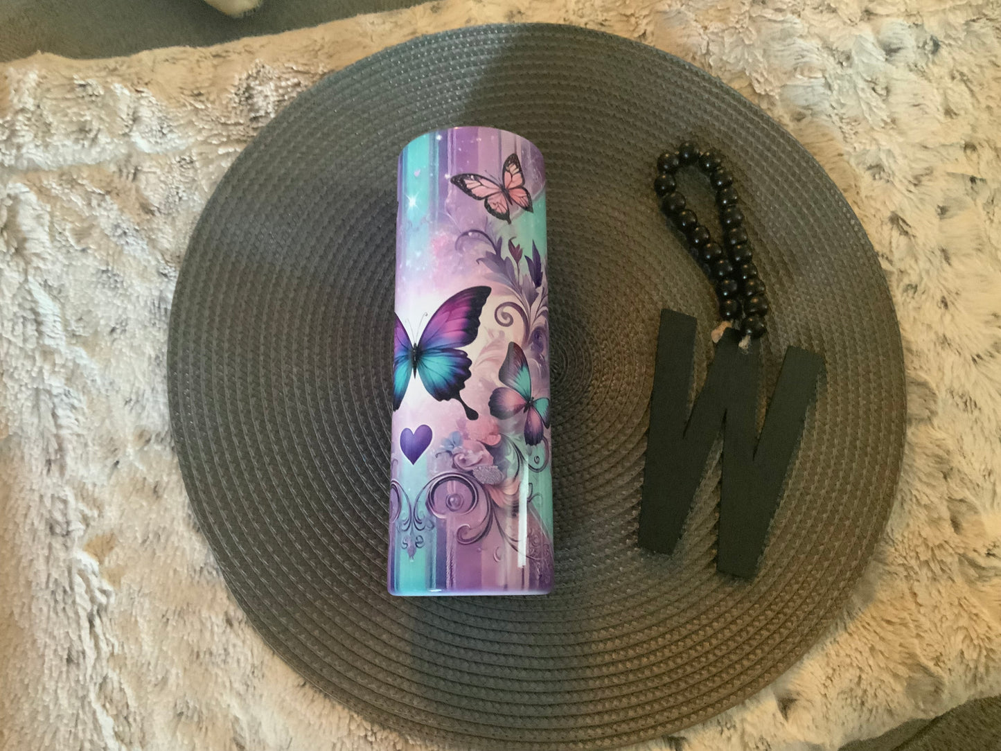 Mama butterfly’s purple and teal