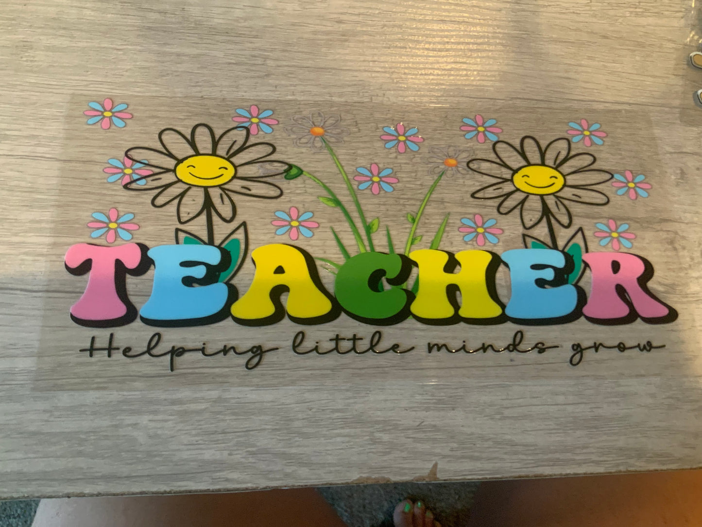 Teacher helping little minds