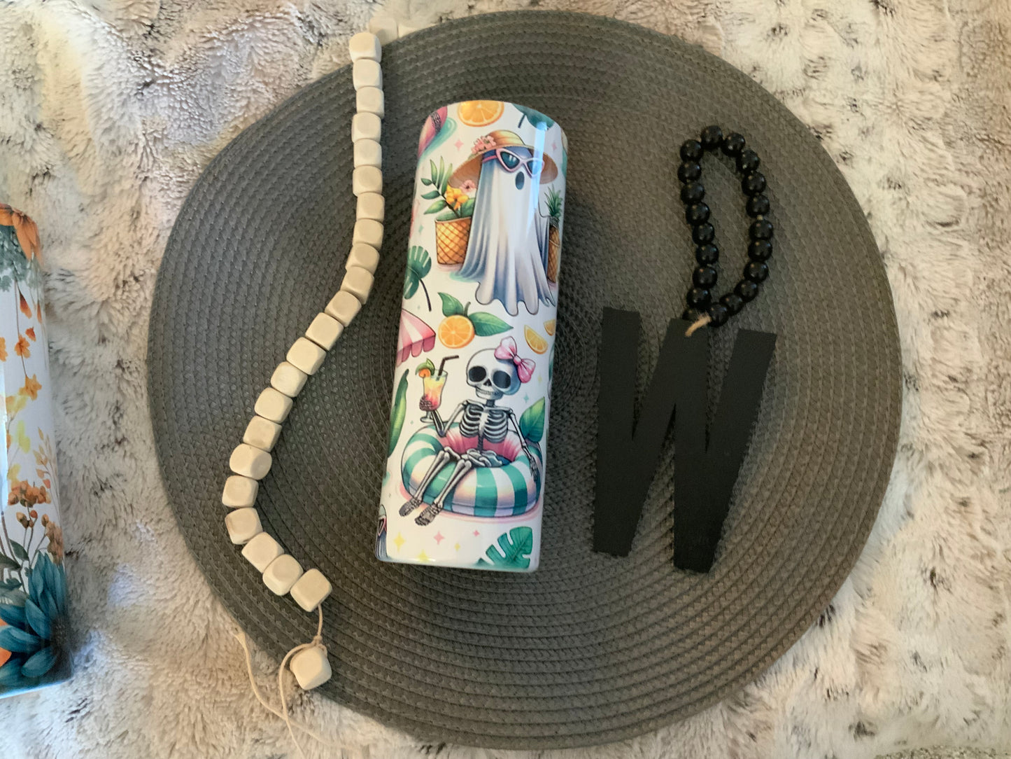 Ghost and Skelly floatie summerween