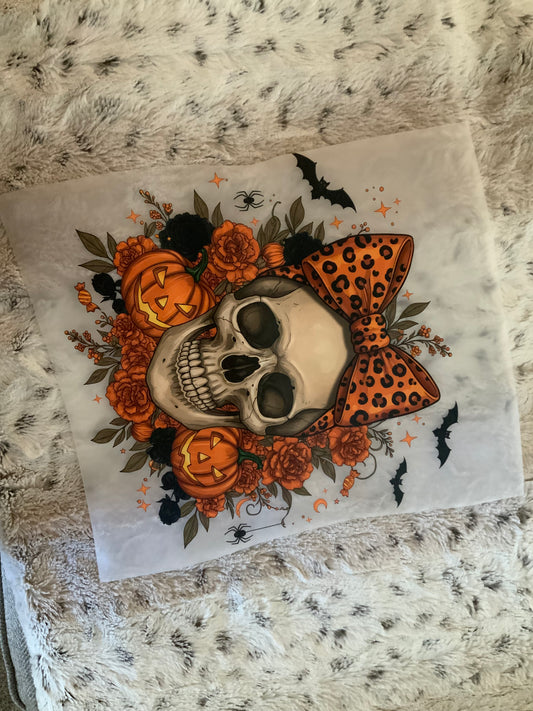 Skelly orange bow