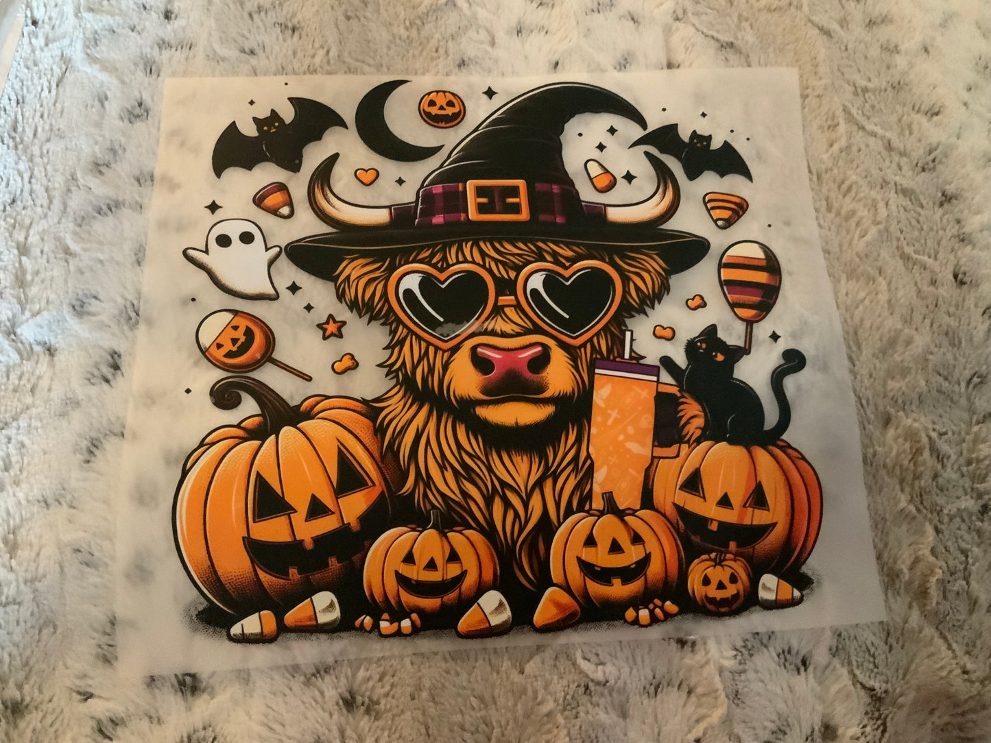 Cow witch pumpkins