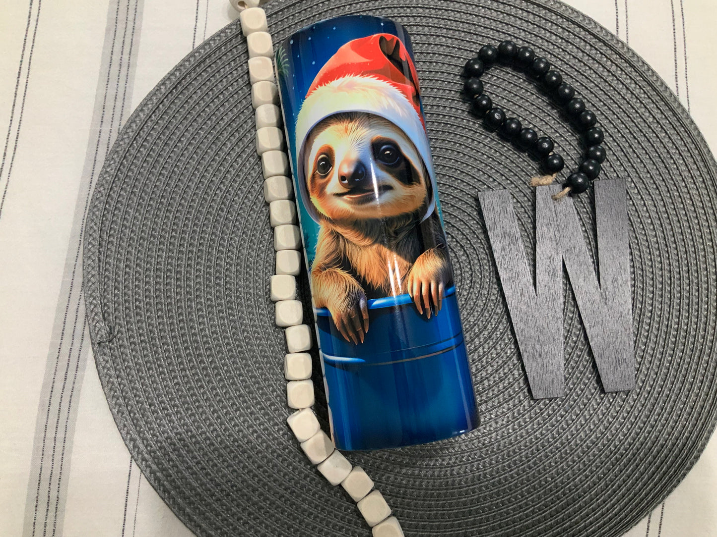 Christmas sloth in a pail